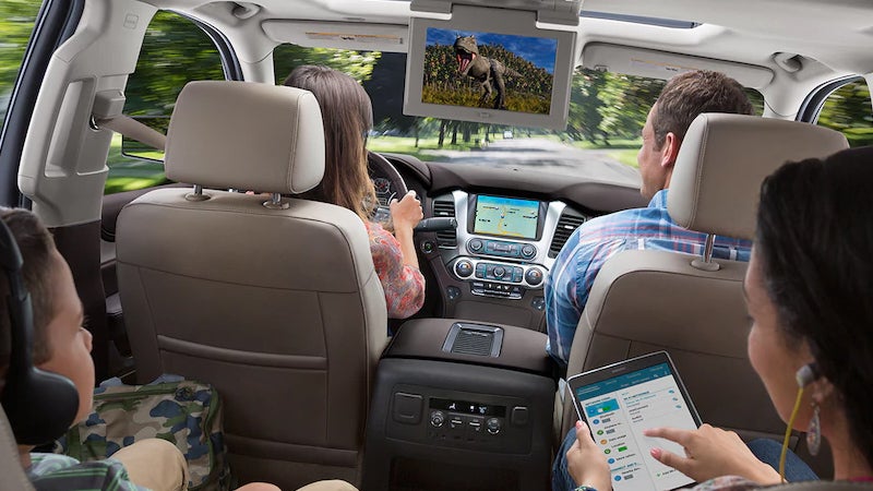 2019 Chevy Tahoe interior with family seated